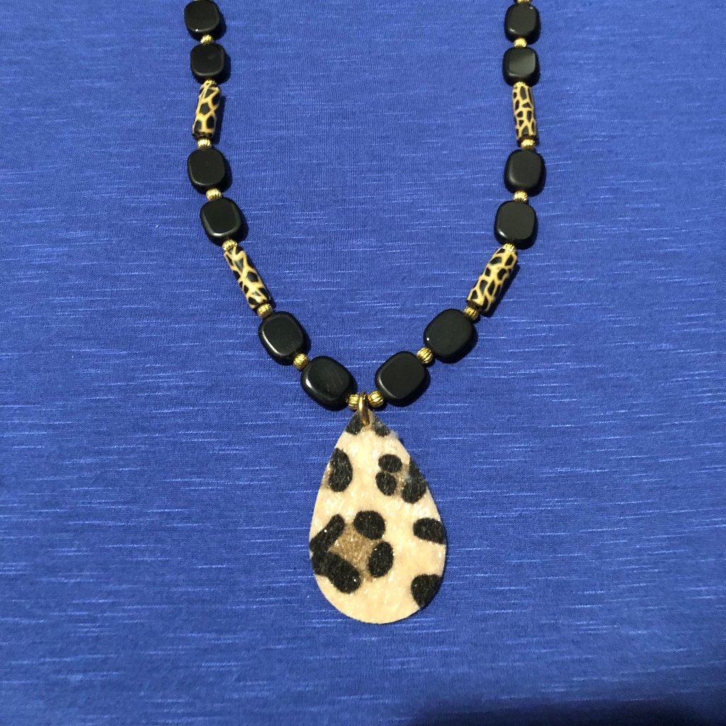 Black, Gold, And Animal Print Necklace And Earrings